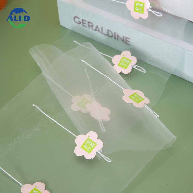 Phim túi trà hình kim tự tháp có thể tái tạo có nhãn và dây